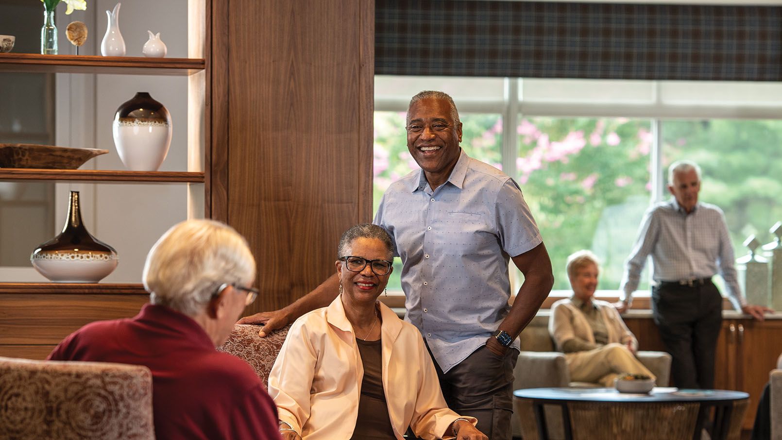 Residents having a conversation in the lounge