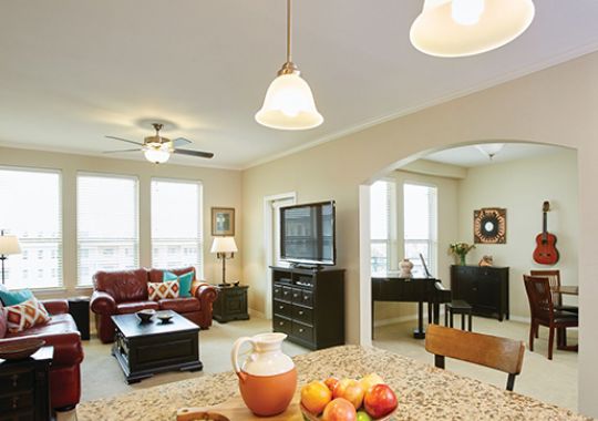 Open concept floor plan with view of kitchen and living room.