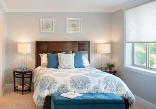 Spacious bedroom on Erickson Senior Living campus.