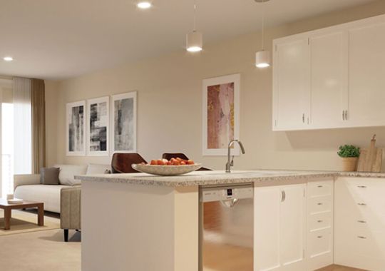 Interior shot of an open dining and living area in an Erickson one-bedroom apartment.