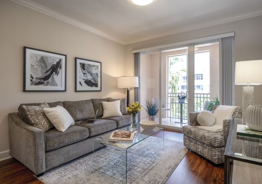 Comfortable and well-furnished living room in an Erickson Senior Living community apartment.