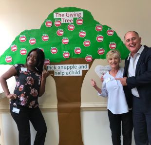 Employees At Devonshire At Pga National Create Giving Tree image