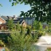 View of fountain in front of Brooksby Village building.