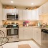 Open and airy u-shaped kitchen.