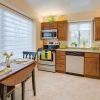 Large kitchen with dining table.