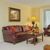 Open concept living room with large windows.