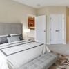 Interior shot of a cozy master bedroom in an Erickson one-bedroom apartment. 