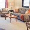 Interior shot of a nicely decorated living room in an Erickson two-bedroom apartment.