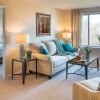 Interior shot of a bright living room in an Erickson two-bedroom apartment.