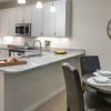 Interior shot of a bright kitchen in an Erickson one-bedroom apartment.