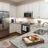 Interior shot of a bright kitchen in an Erickson one-bedroom apartment.