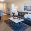 Interior shot of a nicely decorated living room in an Erickson two-bedroom apartment.