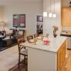 Interior shot of kitchen inside of an Erickson one-bedroom apartment home. 