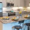 Interior shot of a bright kitchen in an Erickson one-bedroom apartment.