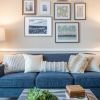 Interior shot of a nicely decorated, open living room in an Erickson two-bedroom apartment home. 