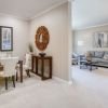 Interior shot of a nicely decorated living room in an Erickson one-bedroom apartment.