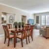 Interior shot of kitchen and dining area inside of an Erickson two-bedroom apartment home. 