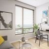 Cozy, light-filled den office in an Erickson one-bedroom apartment.