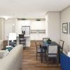 Spacious and inviting apartment living room with cozy seating, tasteful decor, and abundant natural light".