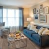Comfortable and well-furnished living room in an Erickson Senior Living community apartment.