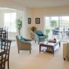 Comfortable and well-furnished living room in an Erickson Senior Living community apartment.