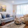 Comfortable and well-furnished living room in an Erickson Senior Living community apartment.