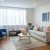 Comfortable and well-furnished living room in an Erickson Senior Living community apartment.