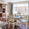 Sunny dining room in an Erickson Senior Living community apartment.