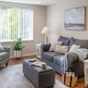 Comfortable and well-furnished living room in an Erickson Senior Living community apartment.