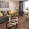 Comfortable and well-furnished living room in an Erickson Senior Living community apartment.