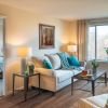 Comfortable and well-furnished living room in an Erickson Senior Living community apartment.