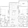 One-bedroom apartment floor plan with open living room, kitchen, primary bedroom, walk-in closet, two bathrooms, and patio.