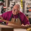 Resident in a wood shop working on a project