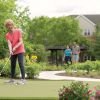 Resident golfing, 2 residents walking on a path